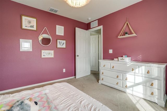 bedroom featuring light carpet, baseboards, and visible vents