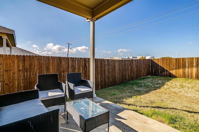 view of patio with a fenced backyard and outdoor lounge area