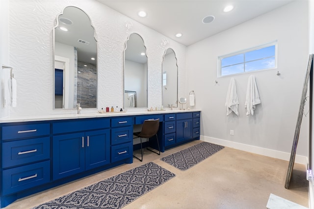 full bathroom featuring double vanity, baseboards, visible vents, a sink, and recessed lighting