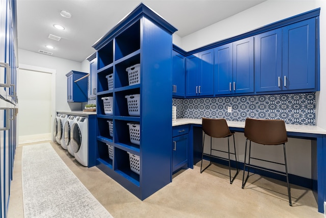 clothes washing area with cabinet space, recessed lighting, visible vents, and washing machine and clothes dryer