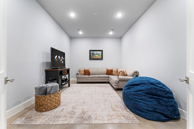 living room with baseboards and recessed lighting