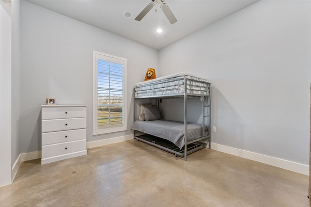 bedroom featuring finished concrete flooring, recessed lighting, a ceiling fan, and baseboards