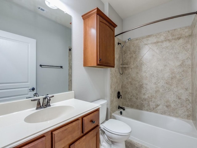 bathroom with toilet, shower / tub combination, visible vents, and vanity