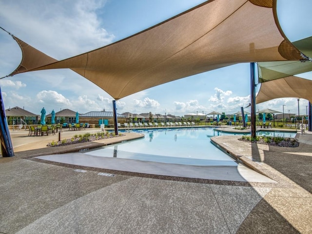 pool featuring a patio area