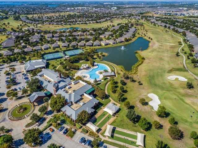 bird's eye view with a residential view, view of golf course, and a water view