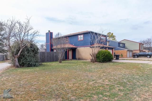 view of front of property with driveway, fence, a front lawn, and brick siding