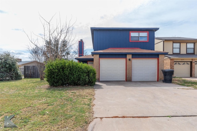 view of front of home featuring a front yard, concrete driveway, brick siding, and an attached garage