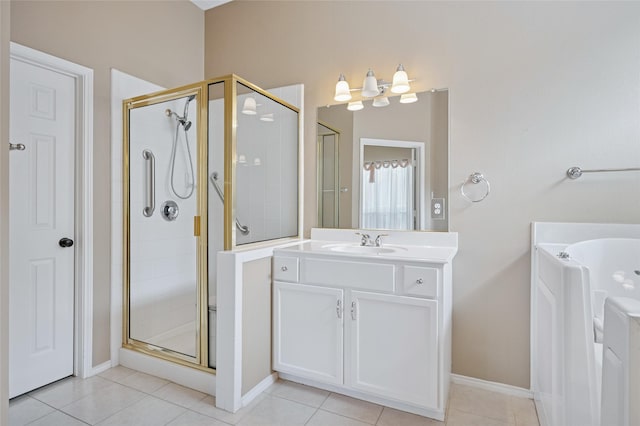 full bathroom featuring a tub to relax in, tile patterned flooring, a shower stall, and vanity