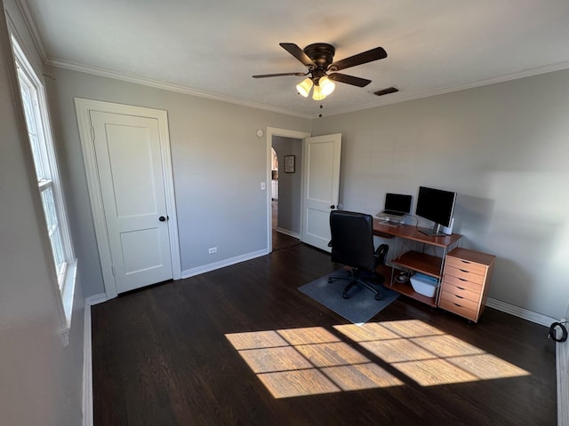 office space featuring crown molding, dark wood-style flooring, visible vents, and baseboards