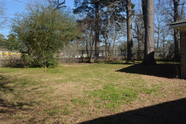 view of yard with fence