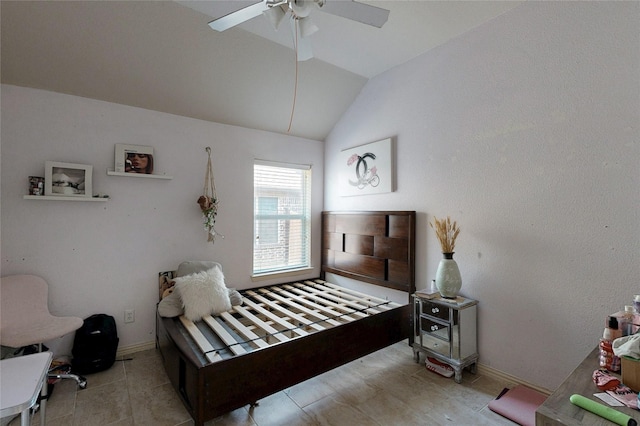 bedroom with lofted ceiling, baseboards, a ceiling fan, and tile patterned floors