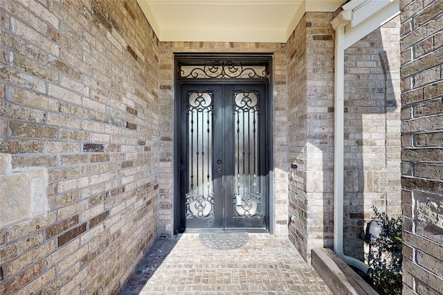 doorway to property featuring french doors