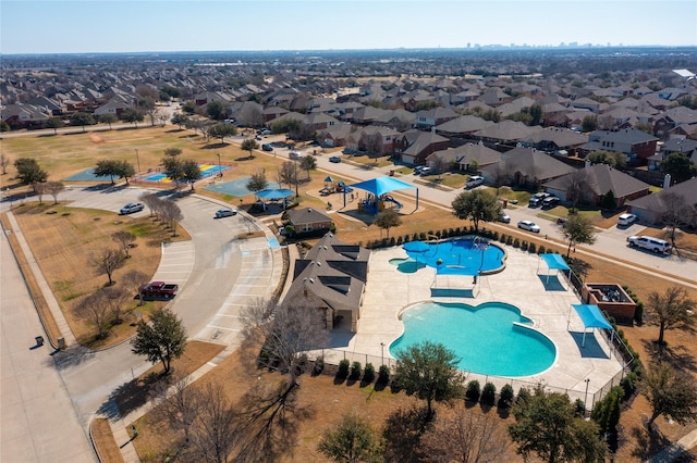 birds eye view of property with a residential view