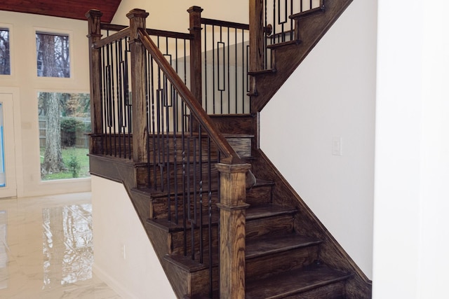 stairway with marble finish floor