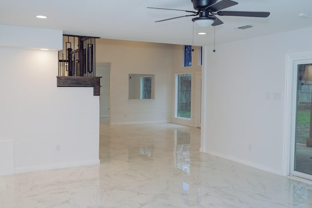 spare room featuring marble finish floor, recessed lighting, visible vents, ceiling fan, and baseboards