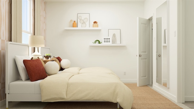 bedroom featuring baseboards