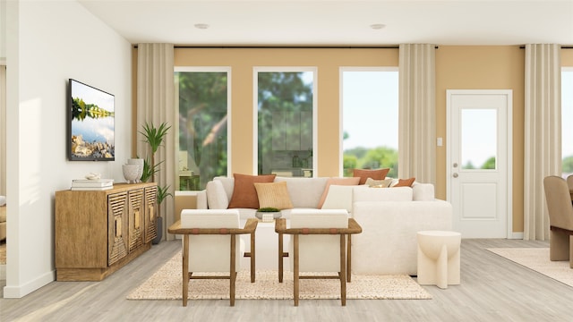 living area featuring light wood finished floors and baseboards