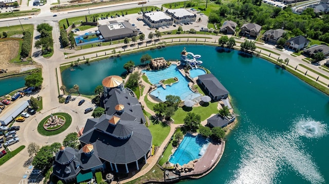 bird's eye view with a water view and a residential view