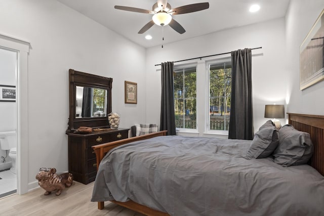 bedroom featuring a ceiling fan, recessed lighting, baseboards, and wood finished floors