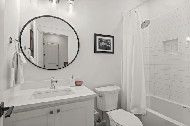 full bathroom featuring vanity, toilet, and shower / bath combo with shower curtain