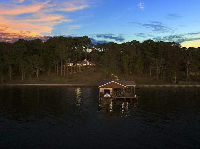 view of dock with a water view and boat lift