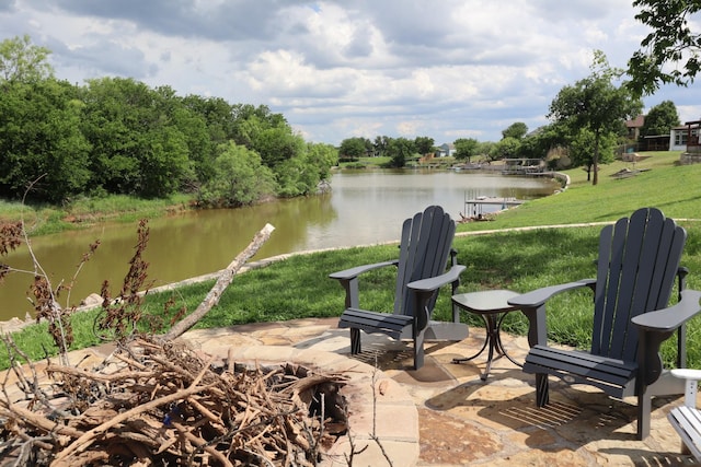 view of patio / terrace with a water view