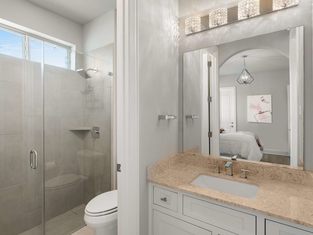 bathroom with a stall shower, toilet, ensuite bath, and vanity