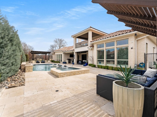 outdoor pool featuring an in ground hot tub, a pergola, and a patio