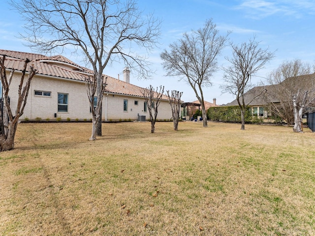 view of yard featuring central AC