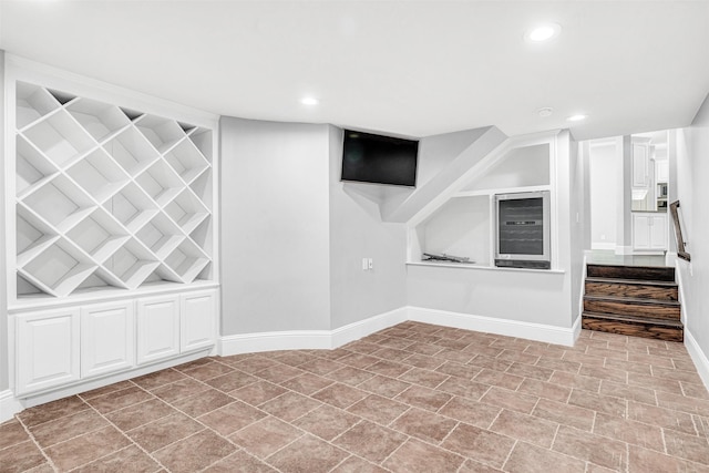 interior space with recessed lighting, stairway, and baseboards