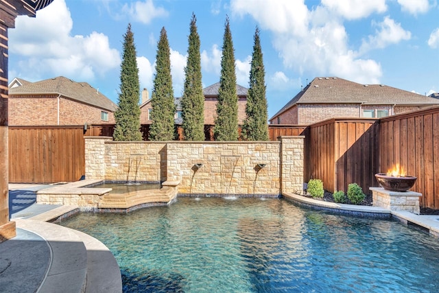 view of swimming pool with a fenced backyard and a fenced in pool