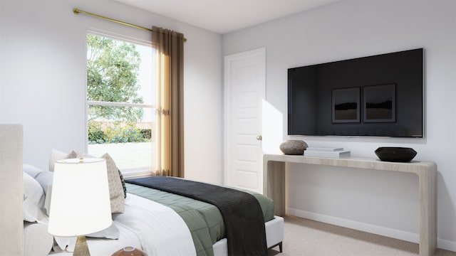 bedroom with carpet floors and baseboards