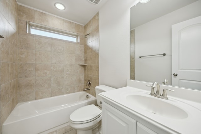 full bath featuring shower / tub combination, vanity, and toilet