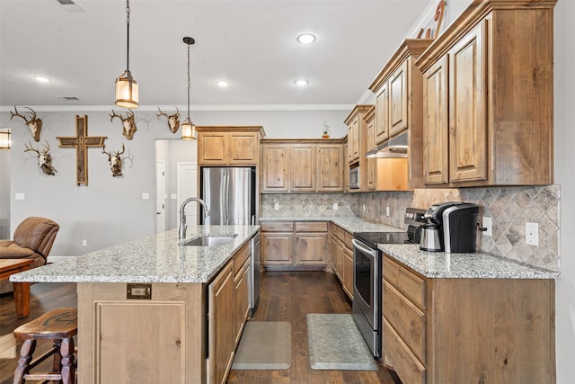 kitchen with dark wood-style flooring, appliances with stainless steel finishes, ornamental molding, a sink, and under cabinet range hood