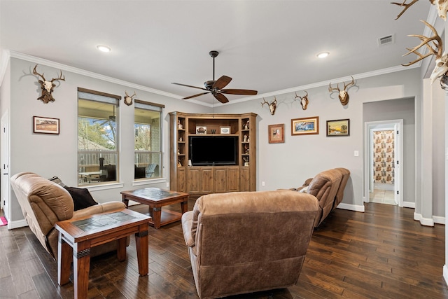 living room featuring baseboards, dark wood-style flooring, visible vents, and crown molding