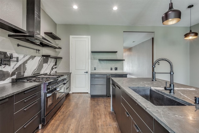 kitchen with wall chimney exhaust hood, double oven range, open shelves, and a sink