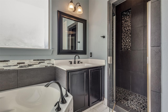 full bath with a stall shower, a garden tub, and vanity