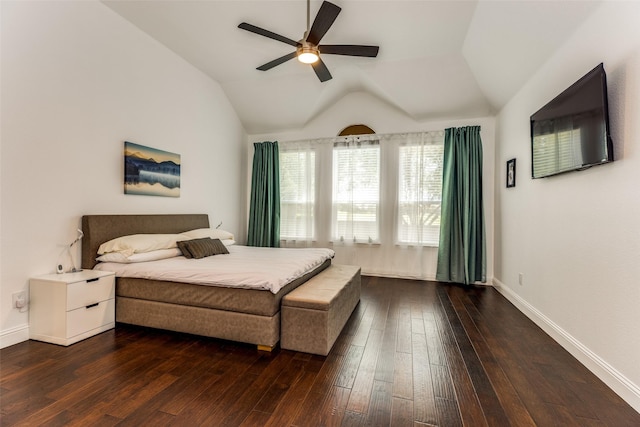 bedroom featuring vaulted ceiling, ceiling fan, dark wood finished floors, and baseboards