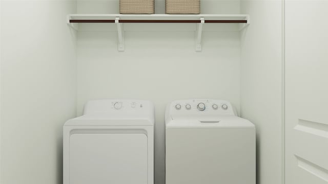 laundry area featuring laundry area and washer and clothes dryer