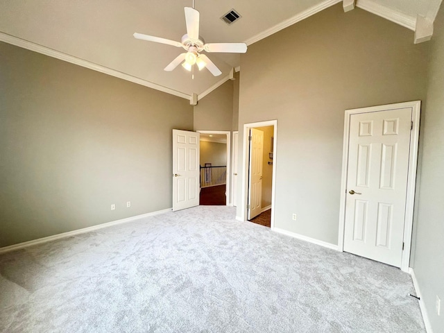 unfurnished bedroom with baseboards, visible vents, and crown molding