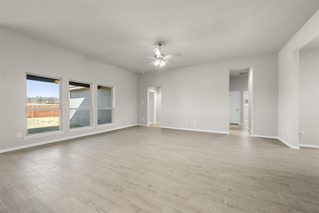 433 Falcon, Azle, TX 76020 - unfurnished room with baseboards, a ceiling fan, and wood finished floors