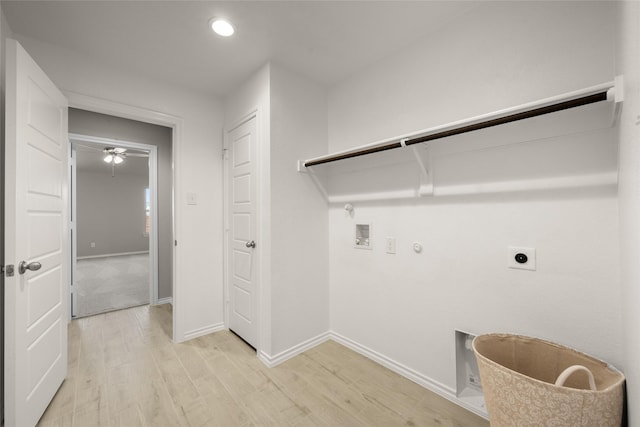 laundry room featuring light wood-type flooring, laundry area, hookup for a washing machine, hookup for a gas dryer, and electric dryer hookup