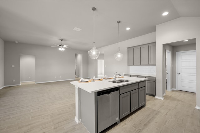 433 Falcon, Azle, TX 76020 - kitchen featuring stainless steel dishwasher, gray cabinetry, a sink, and light wood-style flooring