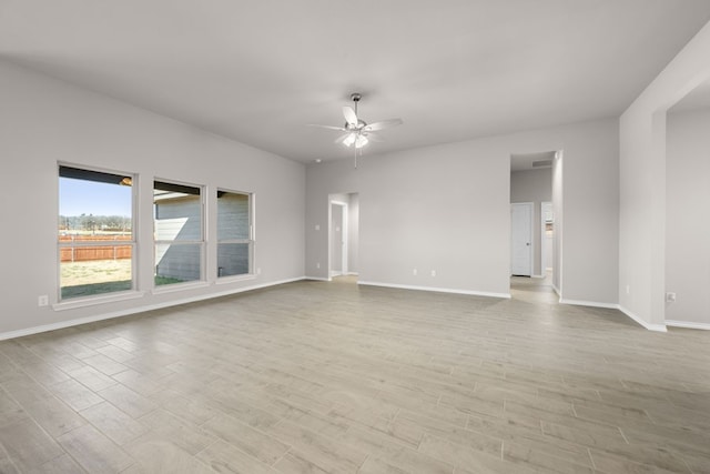 433 Falcon, Azle, TX 76020 - spare room featuring baseboards, wood finished floors, and ceiling fan