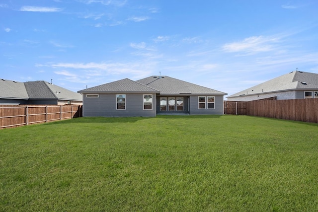 433 Falcon, Azle, TX 76020 - rear view of house featuring a fenced backyard and a yard