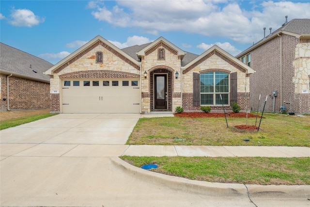 french country style house featuring concrete driveway, brick siding, an attached garage, and a front yard