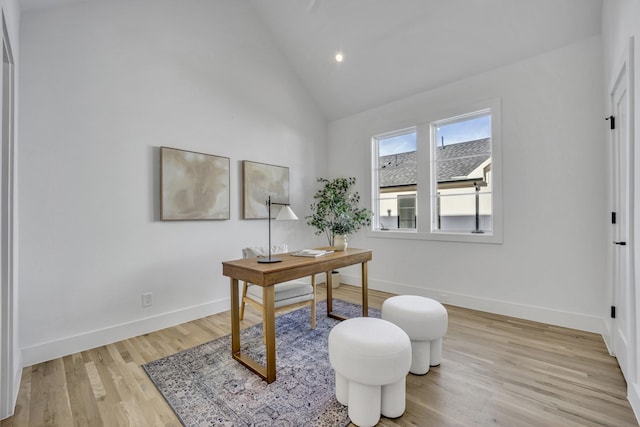 home office with lofted ceiling, light wood-style flooring, baseboards, and recessed lighting