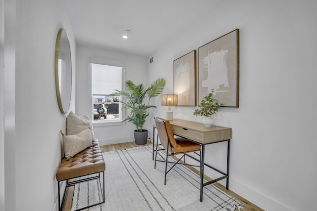 office area with recessed lighting, wood finished floors, and baseboards