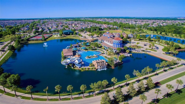 bird's eye view featuring a residential view and a water view