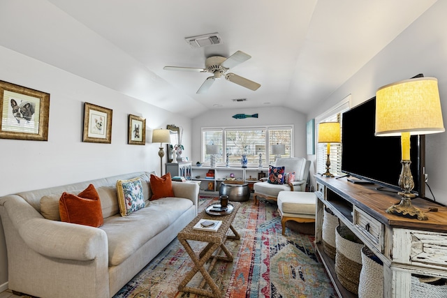 living room featuring a ceiling fan, lofted ceiling, and visible vents